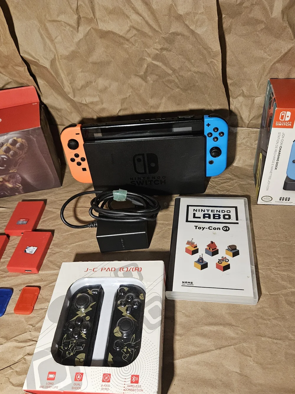 Nintendo Switch Console with Orange Left & Blue Right Joy-Con and Travel Case